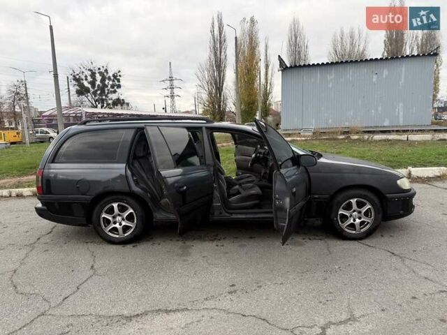 Сірий Опель Омега, об'ємом двигуна 2 л та пробігом 247 тис. км за 2200 $, фото 22 на Automoto.ua