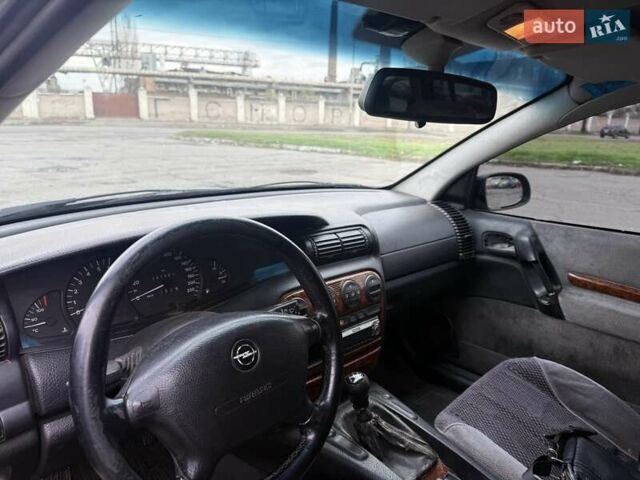 Сірий Опель Омега, об'ємом двигуна 2 л та пробігом 247 тис. км за 2200 $, фото 28 на Automoto.ua
