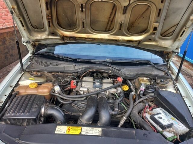 Серый Опель Омега, объемом двигателя 2.5 л и пробегом 300 тыс. км за 3700 $, фото 13 на Automoto.ua