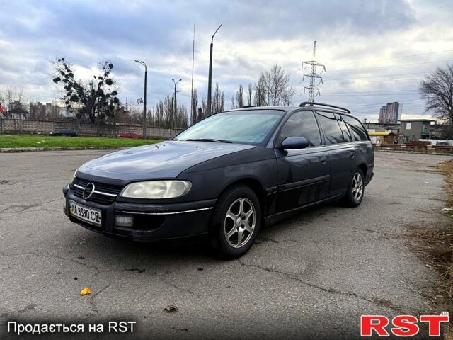 Сірий Опель Омега, об'ємом двигуна 2 л та пробігом 247 тис. км за 1999 $, фото 2 на Automoto.ua