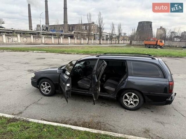 Сірий Опель Омега, об'ємом двигуна 2 л та пробігом 247 тис. км за 2200 $, фото 25 на Automoto.ua