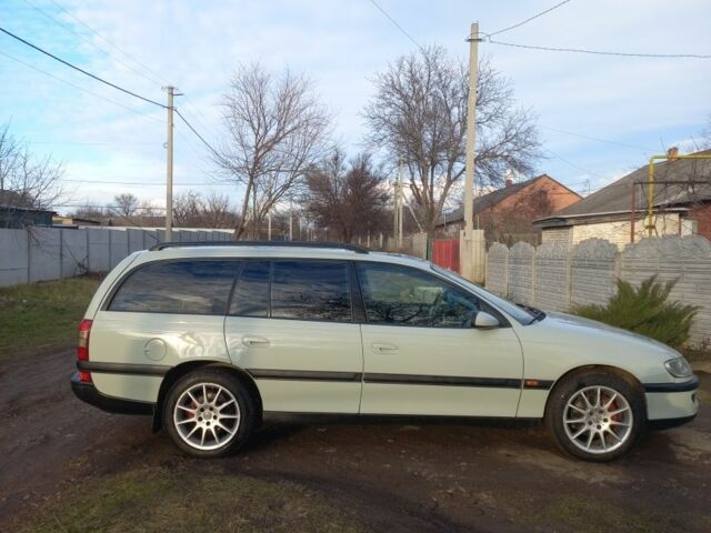 Серый Опель Омега, объемом двигателя 2.5 л и пробегом 300 тыс. км за 3700 $, фото 12 на Automoto.ua