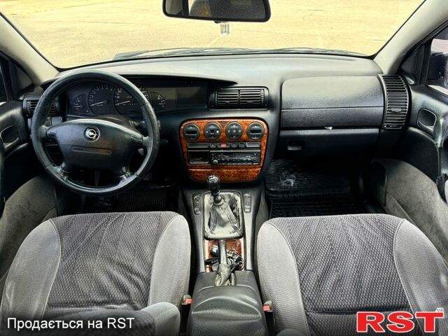 Сірий Опель Омега, об'ємом двигуна 2 л та пробігом 300 тис. км за 1400 $, фото 10 на Automoto.ua