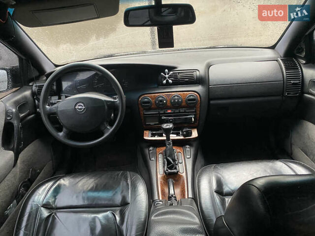 Серый Опель Омега, объемом двигателя 2 л и пробегом 300 тыс. км за 1750 $, фото 9 на Automoto.ua