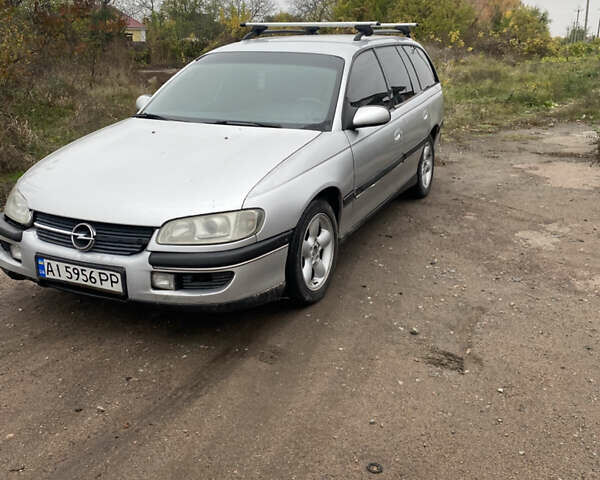 Серый Опель Омега, объемом двигателя 2 л и пробегом 250 тыс. км за 1800 $, фото 1 на Automoto.ua