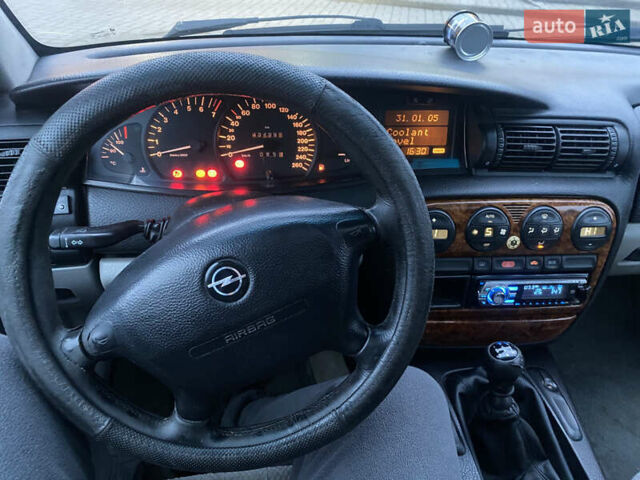Сірий Опель Омега, об'ємом двигуна 2.5 л та пробігом 434 тис. км за 1200 $, фото 11 на Automoto.ua