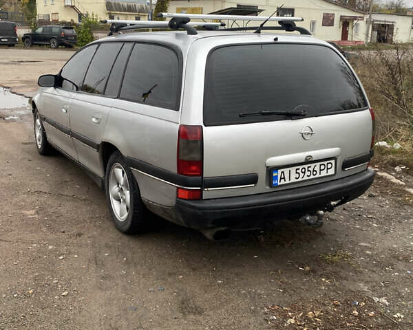 Серый Опель Омега, объемом двигателя 2 л и пробегом 300 тыс. км за 1750 $, фото 2 на Automoto.ua