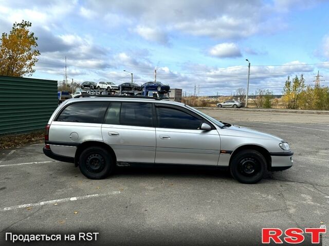 Сірий Опель Омега, об'ємом двигуна 2 л та пробігом 300 тис. км за 1400 $, фото 3 на Automoto.ua