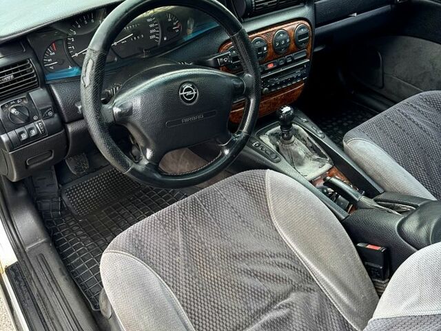 Сірий Опель Омега, об'ємом двигуна 2 л та пробігом 300 тис. км за 1400 $, фото 8 на Automoto.ua