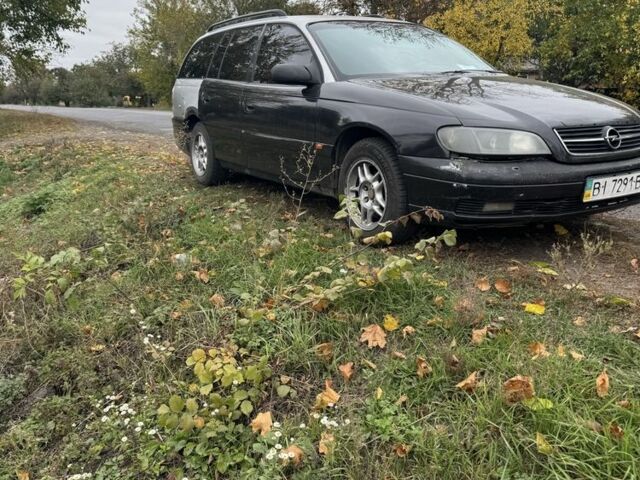 Сірий Опель Омега, об'ємом двигуна 2.5 л та пробігом 80 тис. км за 1004 $, фото 2 на Automoto.ua