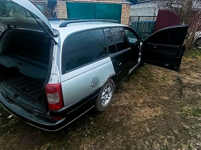 Сірий Опель Омега, об'ємом двигуна 2.5 л та пробігом 300 тис. км за 1600 $, фото 7 на Automoto.ua