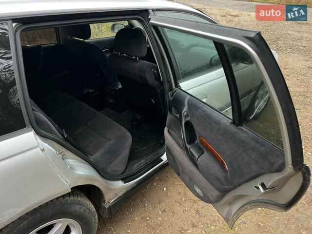 Сірий Опель Омега, об'ємом двигуна 2 л та пробігом 375 тис. км за 1900 $, фото 10 на Automoto.ua