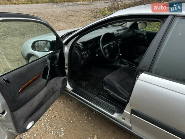 Сірий Опель Омега, об'ємом двигуна 2 л та пробігом 375 тис. км за 1900 $, фото 14 на Automoto.ua