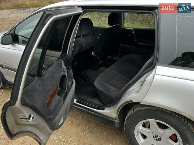 Сірий Опель Омега, об'ємом двигуна 2 л та пробігом 375 тис. км за 1900 $, фото 8 на Automoto.ua