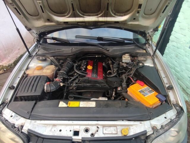 Сірий Опель Омега, об'ємом двигуна 2 л та пробігом 375 тис. км за 1550 $, фото 4 на Automoto.ua