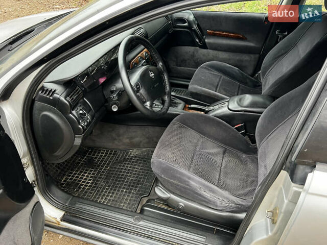 Сірий Опель Омега, об'ємом двигуна 2 л та пробігом 375 тис. км за 1900 $, фото 15 на Automoto.ua