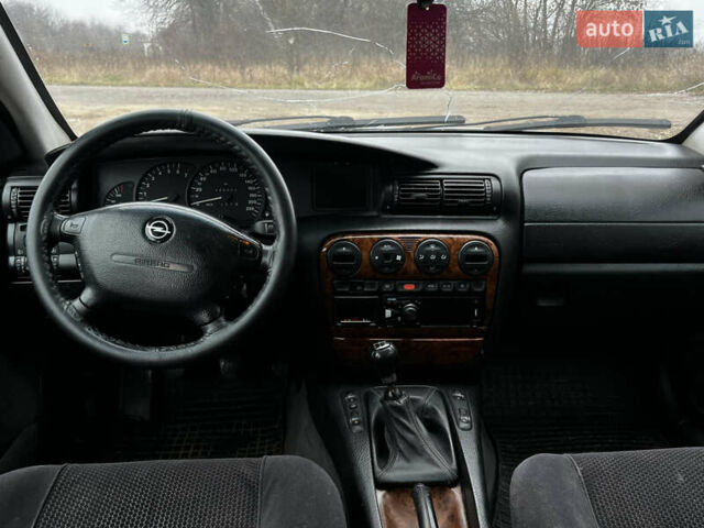Сірий Опель Омега, об'ємом двигуна 2 л та пробігом 375 тис. км за 1900 $, фото 16 на Automoto.ua