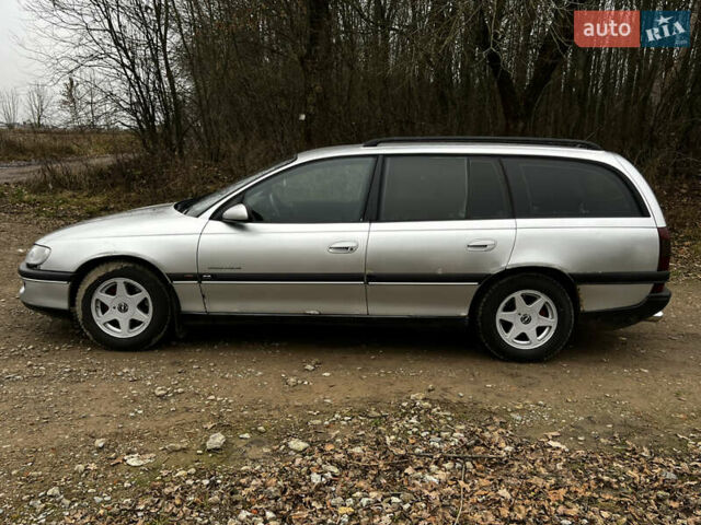 Сірий Опель Омега, об'ємом двигуна 2 л та пробігом 375 тис. км за 1900 $, фото 4 на Automoto.ua