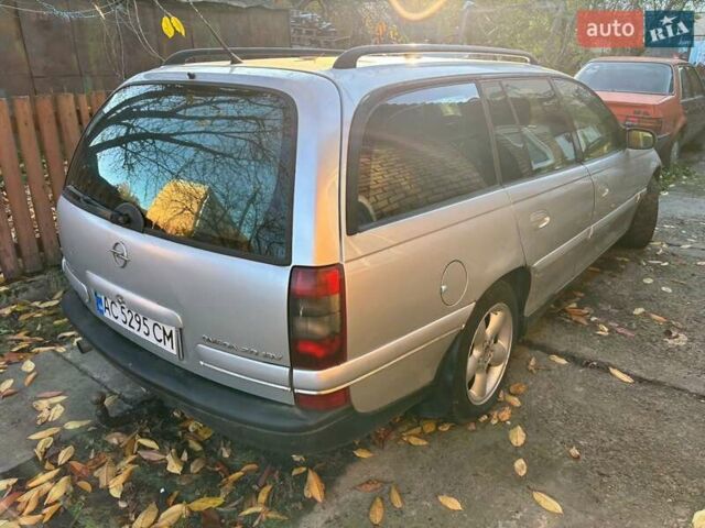 Сірий Опель Омега, об'ємом двигуна 2 л та пробігом 440 тис. км за 1900 $, фото 9 на Automoto.ua