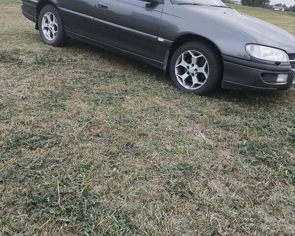 Опель Омега 1998 в Черкассах на Automoto.ua Серый Опель Омега, объемом двигателя 2.5 л и пробегом 282 тыс. км за 3500 $, фото 9 на Automoto.ua