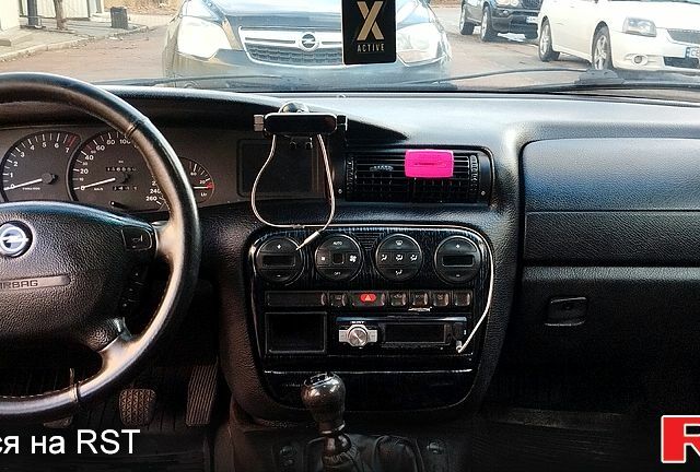 Сірий Опель Омега, об'ємом двигуна 2.5 л та пробігом 320 тис. км за 2600 $, фото 4 на Automoto.ua