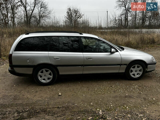 Сірий Опель Омега, об'ємом двигуна 2 л та пробігом 375 тис. км за 1900 $, фото 3 на Automoto.ua