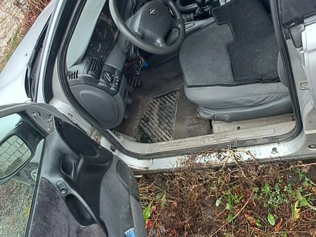 Серый Опель Омега, объемом двигателя 2.5 л и пробегом 260 тыс. км за 700 $, фото 2 на Automoto.ua