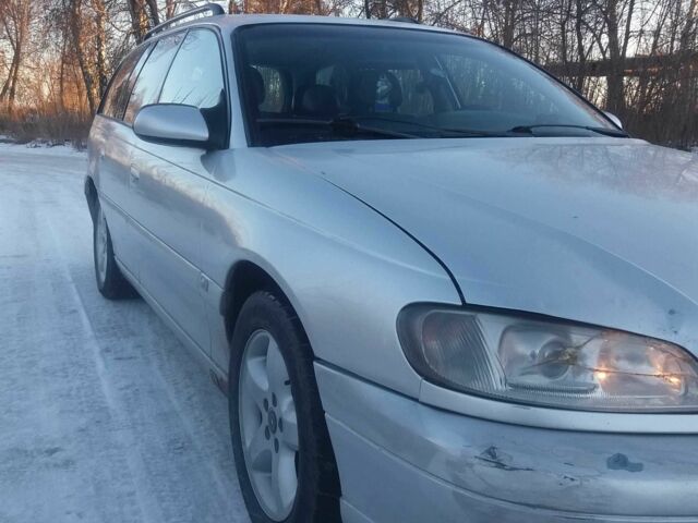 Сірий Опель Омега, об'ємом двигуна 2.5 л та пробігом 295 тис. км за 2000 $, фото 3 на Automoto.ua