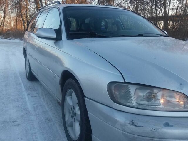 Сірий Опель Омега, об'ємом двигуна 2.5 л та пробігом 295 тис. км за 2000 $, фото 5 на Automoto.ua