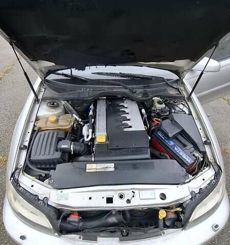 Серый Опель Омега, объемом двигателя 2.5 л и пробегом 310 тыс. км за 3200 $, фото 1 на Automoto.ua