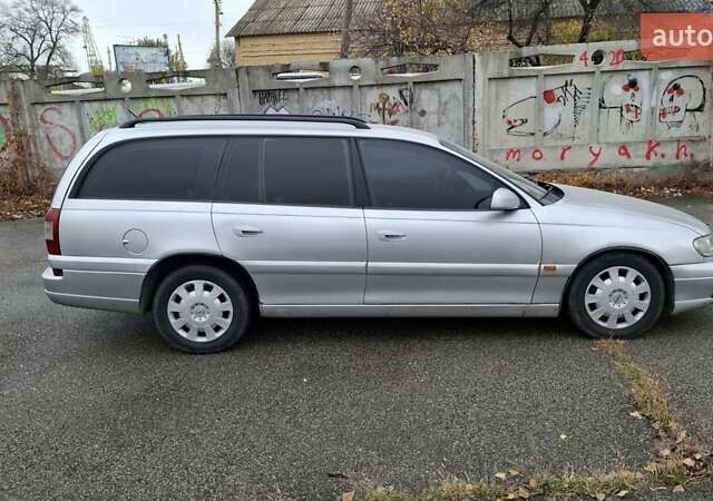 Серый Опель Омега, объемом двигателя 2.5 л и пробегом 310 тыс. км за 3200 $, фото 6 на Automoto.ua