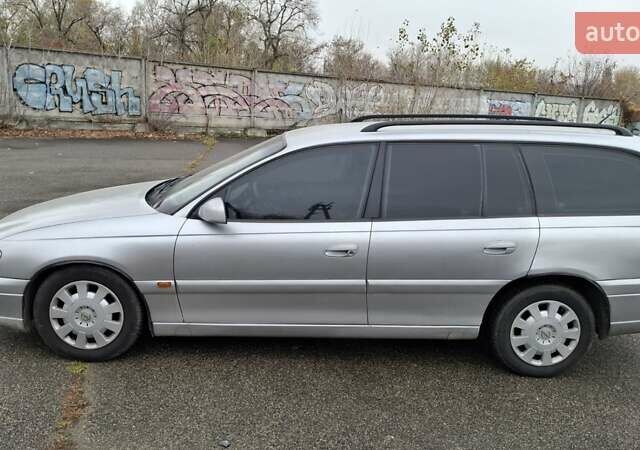 Серый Опель Омега, объемом двигателя 2.5 л и пробегом 310 тыс. км за 3200 $, фото 2 на Automoto.ua