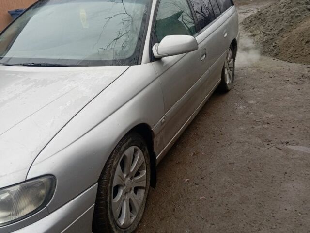 Серый Опель Омега, объемом двигателя 2.2 л и пробегом 220 тыс. км за 1600 $, фото 1 на Automoto.ua