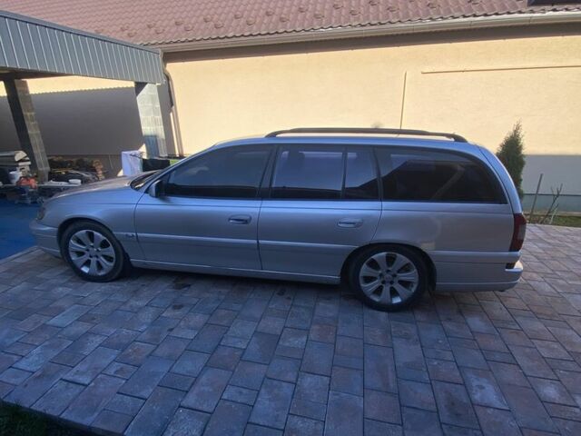 Серый Опель Омега, объемом двигателя 2.2 л и пробегом 350 тыс. км за 1500 $, фото 1 на Automoto.ua