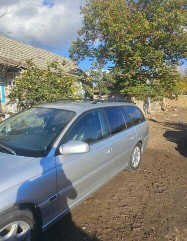 Серый Опель Омега, объемом двигателя 2.5 л и пробегом 330 тыс. км за 3500 $, фото 9 на Automoto.ua