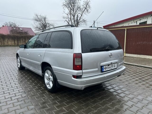 Серый Опель Омега, объемом двигателя 2.2 л и пробегом 384 тыс. км за 2450 $, фото 3 на Automoto.ua