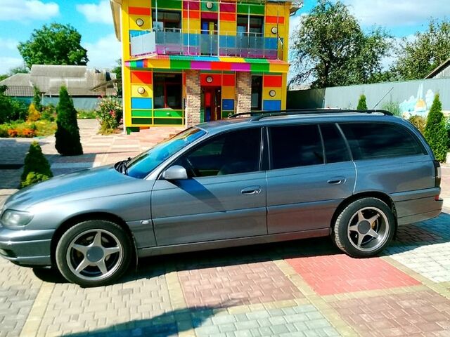 Сірий Опель Омега, об'ємом двигуна 2.6 л та пробігом 296 тис. км за 4200 $, фото 2 на Automoto.ua