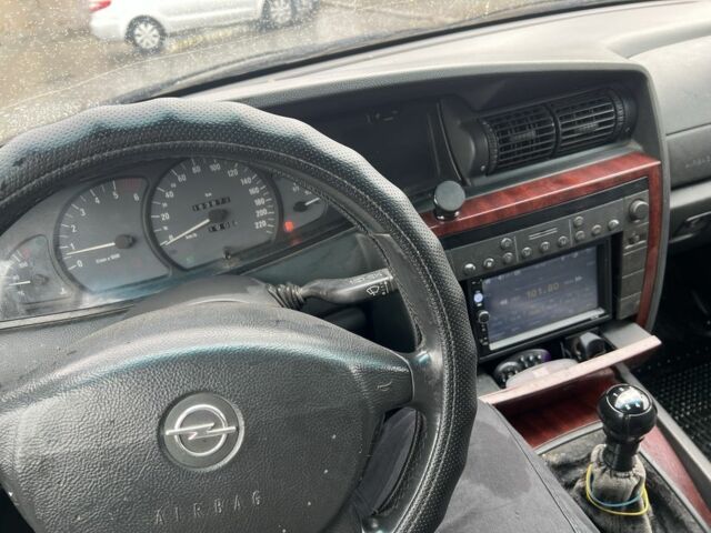 Серый Опель Омега, объемом двигателя 2.2 л и пробегом 384 тыс. км за 2450 $, фото 8 на Automoto.ua