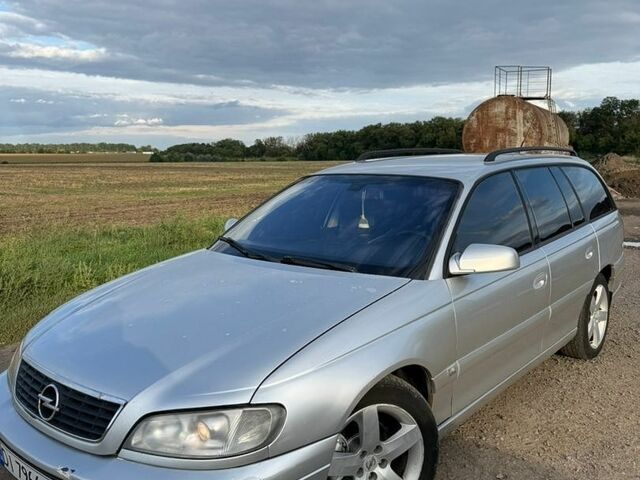 Сірий Опель Омега, об'ємом двигуна 2.5 л та пробігом 282 тис. км за 2200 $, фото 4 на Automoto.ua