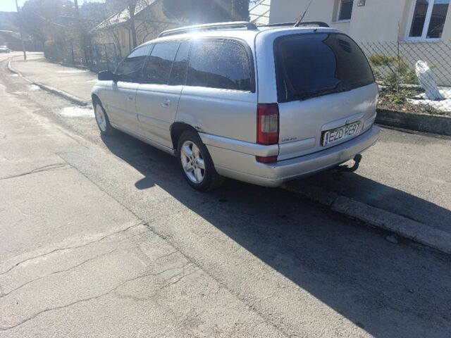 Сірий Опель Омега, об'ємом двигуна 2 л та пробігом 302 тис. км за 1600 $, фото 3 на Automoto.ua