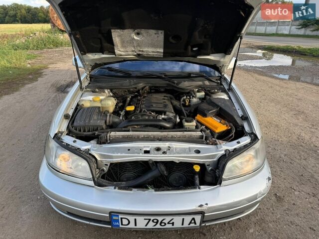 Сірий Опель Омега, об'ємом двигуна 2.5 л та пробігом 282 тис. км за 2200 $, фото 17 на Automoto.ua