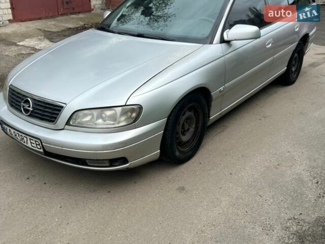 Серый Опель Омега, объемом двигателя 2.5 л и пробегом 451 тыс. км за 1800 $, фото 1 на Automoto.ua