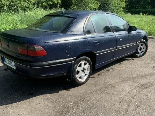 Синий Опель Омега, объемом двигателя 2.5 л и пробегом 1 тыс. км за 1900 $, фото 2 на Automoto.ua