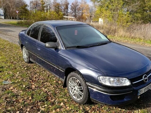 Синий Опель Омега, объемом двигателя 2 л и пробегом 350 тыс. км за 1670 $, фото 2 на Automoto.ua