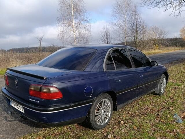 Синий Опель Омега, объемом двигателя 2 л и пробегом 350 тыс. км за 1670 $, фото 5 на Automoto.ua