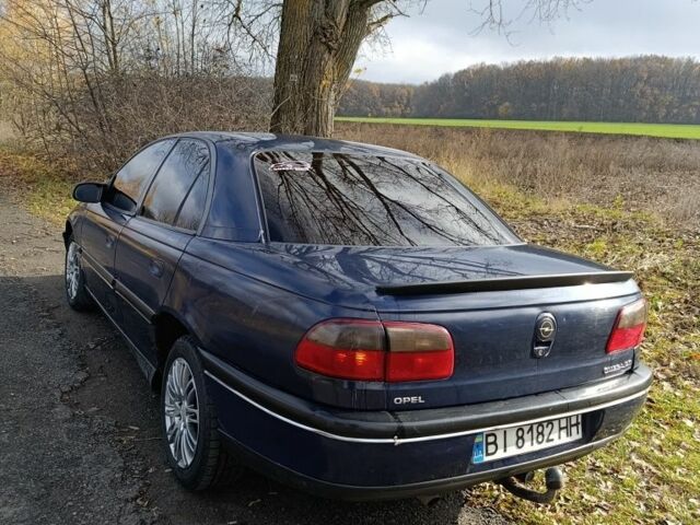 Синий Опель Омега, объемом двигателя 2 л и пробегом 350 тыс. км за 1670 $, фото 4 на Automoto.ua