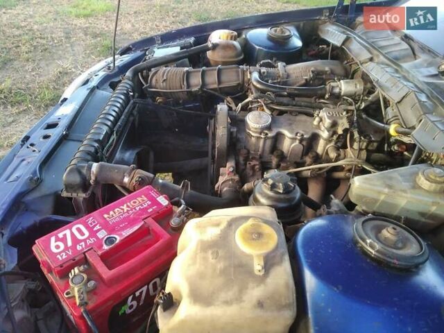 Синий Опель Омега, объемом двигателя 2 л и пробегом 270 тыс. км за 1500 $, фото 12 на Automoto.ua