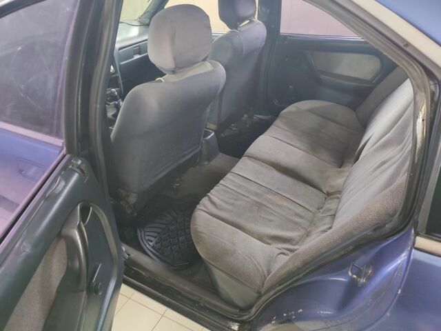 Синий Опель Омега, объемом двигателя 1.8 л и пробегом 250 тыс. км за 999 $, фото 5 на Automoto.ua