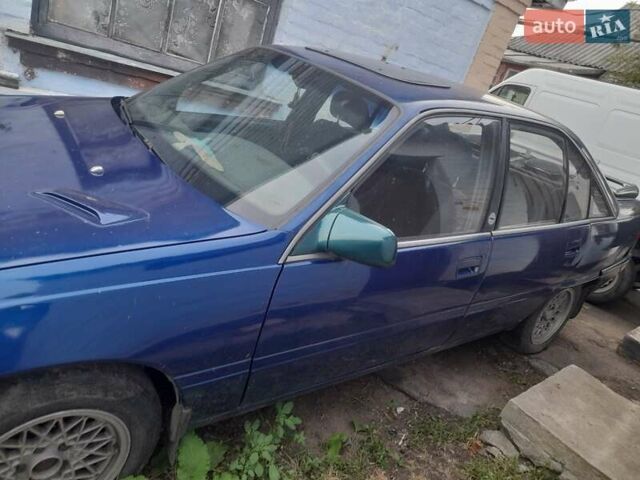 Синий Опель Омега, объемом двигателя 1.8 л и пробегом 402 тыс. км за 700 $, фото 1 на Automoto.ua
