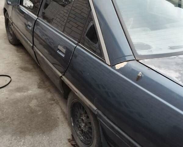 Синій Опель Омега, об'ємом двигуна 1.8 л та пробігом 100 тис. км за 590 $, фото 5 на Automoto.ua